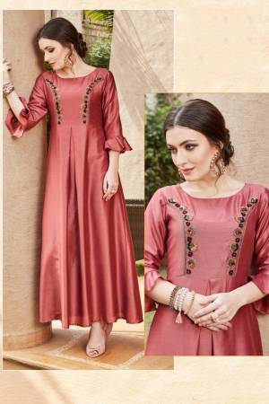 For Your Semi-Casuals Or Social Gatherings, Grab This Designer Readymade Kurti In Maroon Color. It Has Pretty Attractive Hand Work Which Gives A Rich And Elegant Look Over All. Buy Now.