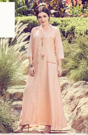Get For The Upcoming Festive Season With This Readymade Kurti In Light Peach Color. This Pretty Kurti Is Beautified With Minimal Hand Work And Available In All Regular Sizes. 