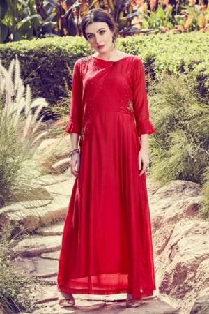 Here Is A Very Beautiful Designer Readymade Kurti In Red Color. It Has Very Pretty And Trendy Color Beautified With Hand Work. Also It IS Light In Weight And Ensures Superb Comfort All Day Long. 