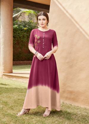 For Your Semi-Casuals Or Social Gatherings, Grab This Designer Readymade Kurti In Maroon & Beige Color. It Has Pretty Attractive Hand Work Which Gives A Rich And Elegant Look Over All. Buy Now.