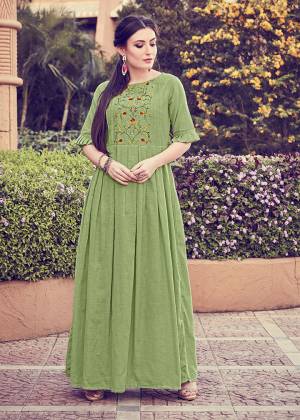 For Your Semi-Casuals Or Social Gatherings, Grab This Designer Readymade Kurti In Light Green Color. It Has Pretty Attractive Hand Work Which Gives A Rich And Elegant Look Over All. Buy Now.