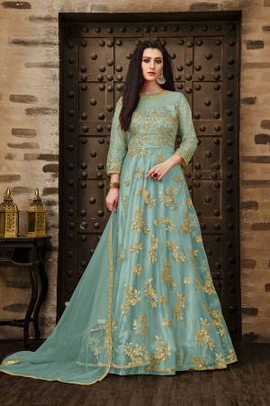 Add This Very Pretty Rich And Elegant Looking Designer Floor Length Suit In Sky Blue Color. This Heavy Embroidered Suit IS Net Based Paired With Santoon Bottom And Net Dupatta. Its Rich Color And Elegant Embroidery Will earn You Lots Of Compliments From onlookers. Buy Now.