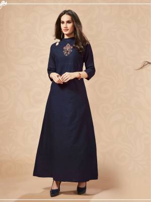 Enhance Your Personality Wearing This Designer Long Kurti In Navy Blue Color. This Cotton based Readymade Kurti Is Beautified With Hand Work Giving It An Attractive Look. Buy Now.