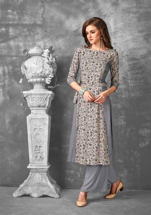 Rich And Elegant Looking Readymade Kurti Is Here In Sand Grey Color Fabricated On Rayon. This Kurti Is Beautified With Small Floral Prints. Its Pretty Color And Print Will Earn you Lots Of Compliments. 