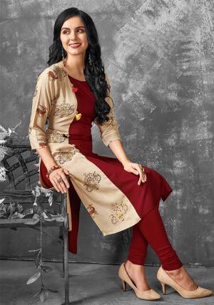 Add This Pretty Kurti To Your Wardrobe In Maroon And Beige Color Fabricated On Cotton. It Is Light In Weight And Easy To Carry All Day Long. 