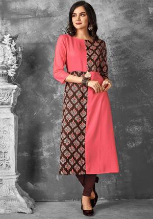 Look Pretty In This Readymade Kurti In Pink And Brown Color Fabricated On Rayon. It Is Beautified With Bold Prints with A Very Unqiue Pattern. Buy Now.