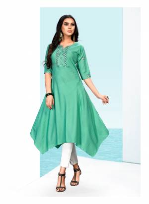 Asymetric Patterned Designer Readymade Kurti IS Here In Sea Green Color Fabricated On Khadi Cotton Beautified with Multi Colored Thread Work. 