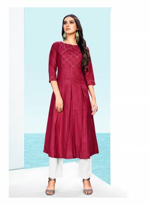 For A Bold And Beautiful Look, Grab This Very Beautiful Designer Readymade Kurti In Maroon Color. This Cotton Based Kurti IS Beautified With Simple And Elegant Thread Work, Also It IS Light In Weight And Easy To Carry All Day Long. 