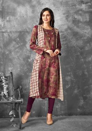 Simple And Elegant Looking Readymade Kurti Is Here In Brown And Magenta Pink Color Fabricated On Rayon. This Kurti Is Light In Weight And Easy To Carry All Day Long. 