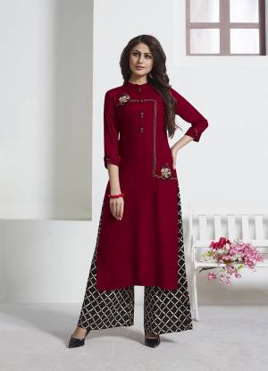Add This Very Beautiful Designer Readymade Kurta Set In Maroon Paired With Black Colored Bottom. This Pretty Set Is Rayon Based Beautified With Prints And Thread Work. Also It Is Available In All  Sizes. Buy Now.