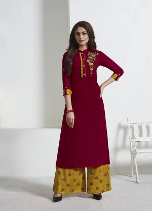 Get Ready For The Upcoming Festive Season With This Readymade Designer Pair Of Kurti And Pant In Maroon Colored Paired With Contrasting Musturd Yellow Colored Bottom. Its Top IS Fabricated On Rayon Slub Paired With Rayon Fabricated Bottom. 