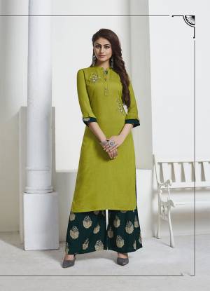 Lovely Color Pallete Is Here With This Designer Readymade Pair Of Kurti And Plazzo In Parrot Green Colored Top Paired With Peacock Green Colored Bottom. Its Top And Bottom are Rayon Based Beautified With Foil Print And Hand Work. 