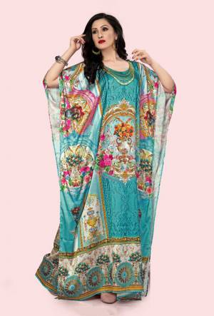 Grab this Very Beautiful Readymade Kaftan In Turquoise Blue Color Fabricated On Satin. It Is Beautified With Prints All Over With Stone Work. It Is Available In Free Size And Its Fabric Is Soft Towards Skin Which Ensures Superb Comfort All Day Long. 