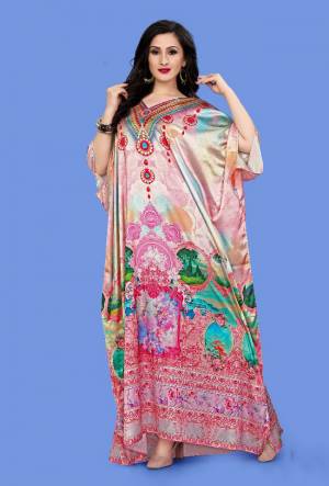 A Must Have Piece To Your Wardrobe Is Here With This Beautiful Readymade Kaftan In Baby Pink Color. This Pretty Kaftan Is Fabricated on Satin beautified With Prints And Stone Work. Also It Is In Free Size Which Ensures Superb Comfort. Buy Now.