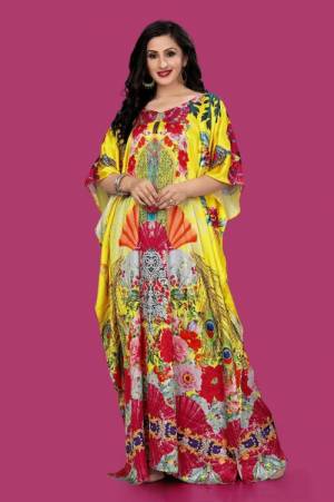 A Must Have Piece To Your Wardrobe Is Here With This Beautiful Readymade Kaftan In Yellow Color. This Pretty Kaftan Is Fabricated on Satin beautified With Prints And Stone Work. Also It Is In Free Size Which Ensures Superb Comfort. Buy Now.