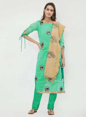 If Those Readymade Suit Does Not Lend You Desired Comfort, Than Grab This Dress Material In Sea Green And Beige Color. Its top Is Fabricated On Chanderi Cotton Paired With Santoon Bottom And Chanderi Cotton Dupatta. Get This Stitched As Per Your Desired Fit And Comfort. Buy Now.