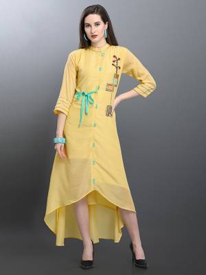 Beautiful High Low Patterned Designer Readymade Kurti Is Here In Light Yellow Color Fabricated On Muslin. Its Pretty Color And Soft Fabric Will Earn You Lots Of Compliments From Onlookers. 