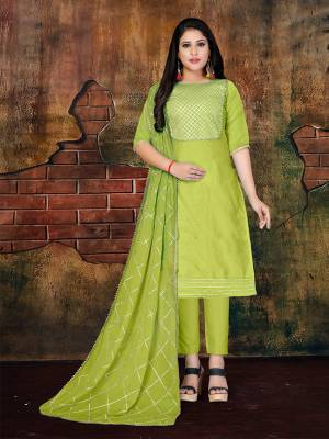 Here Is A Very Pretty Dress Material For Your Semi-Casual Wear In Parrot Green. This Dress Material Is Silk Based Paired With Santoon Bottom And Chiffon Fabricated Dupatta. Get This Stitched As Per Your Desired Fit And Comfort. Buy Now.