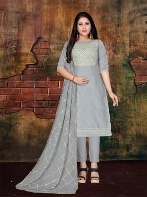 Here Is A Very Pretty Dress Material For Your Semi-Casual Wear In Grey. This Dress Material Is Silk Based Paired With Santoon Bottom And Chiffon Fabricated Dupatta. Get This Stitched As Per Your Desired Fit And Comfort. Buy Now.