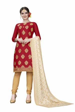 If Those Readymade Suit Does Not Lend You The Desired Comfort Than Grab This Dress Material And Get This Stitched As Per Your Desired Fit And Comfort. Its Top Is In Red Color Paired With Beige Colored Bottom And Dupatta. Buy This Pretty Elegant Cotton Based Dress Material Now.