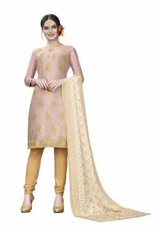 If Those Readymade Suit Does Not Lend You The Desired Comfort Than Grab This Dress Material And Get This Stitched As Per Your Desired Fit And Comfort. Its Top Is In Baby Pink Color Paired With Beige Colored Bottom And Dupatta. Buy This Pretty Elegant Cotton Based Dress Material Now.