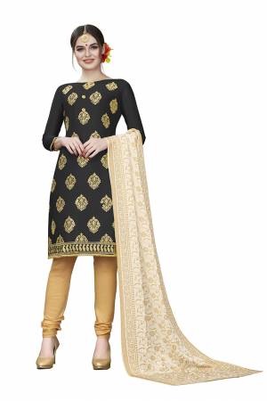 This Festive Season, Adorn A Rich, Simple And Elegant Look With This Dress Material In Black Colored Top Paired With Beige Colored Bottom And Cream Colored Dupatta. This Dress Material Is Cotton Based Beautified With Jari Embroidered Butti. Get This Stitched As Per Your Desired Fit And Comfort. 
