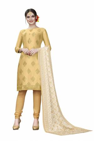 If Those Readymade Suit Does Not Lend You The Desired Comfort Than Grab This Dress Material And Get This Stitched As Per Your Desired Fit And Comfort. Its Top Is In Cream Color Paired With Beige Colored Bottom And Dupatta. Buy This Pretty Elegant Cotton Based Dress Material Now.