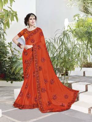 Shine Bright Wearing This Heavy Embroidered Designer Saree In Orange Color Paired With Orange Colored Blouse. This Saree Is Fabricated On Satin Chiffon Paired With Art Silk Fabricated Blouse. It Is Light Weight And Easy To Carry All Day Long. 