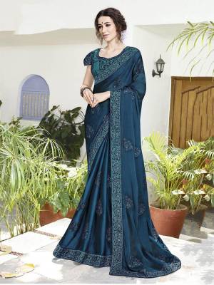 Get Ready For The Upcoming Festive And Wedding Season With This Very Beautiful Designer Saree In Blue Color Paired With Blue Colored Blouse. This Saree Is Fabricated On Satin Chiffon Paired With Art Silk Fabricated Blouse. Buy Now.