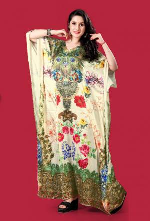 Grab this Very Beautiful Readymade Kaftan In Cream Color?Fabricated On Satin. It Is Beautified With Prints All Over With Stone Work. It Is Available In Free Size And Its Fabric Is Soft Towards Skin Which Ensures Superb Comfort All Day Long.
