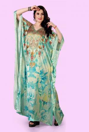 A Must Have Piece To Your Wardrobe Is Here With This Beautiful Readymade Kaftan In Light Blue Color. This Pretty Kaftan Is Fabricated on Satin beautified With Prints And Stone Work. Also It Is In Free Size Which Ensures Superb Comfort. Buy Now