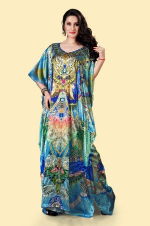 Grab this Very Beautiful Readymade Kaftan In Blue Color?Fabricated On Satin. It Is Beautified With Prints All Over With Stone Work. It Is Available In Free Size And Its Fabric Is Soft Towards Skin Which Ensures Superb Comfort All Day Long.