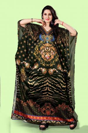 A Must Have Piece To Your Wardrobe Is Here With This Beautiful Readymade Kaftan In Black Color. This Pretty Kaftan Is Fabricated on Satin beautified With Prints And Stone Work. Also It Is In Free Size Which Ensures Superb Comfort. Buy Now