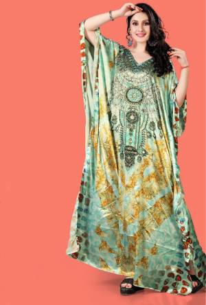 Grab this Very Beautiful Readymade Kaftan In Mint Green Color?Fabricated On Satin. It Is Beautified With Prints All Over With Stone Work. It Is Available In Free Size And Its Fabric Is Soft Towards Skin Which Ensures Superb Comfort All Day Long.