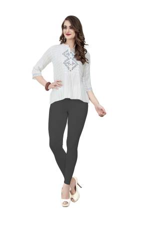 Grab This Super Comfy Readymade Ankle Length Leggings To Pair Up With Your Kurti Or Tunics. This Plain Leggings Is Fabricated On Stretchable Cotton Which Has Four Side Stretch.It Is Available In Free Size Which Ensures Superb Comfort All Day Long. Buy Now.