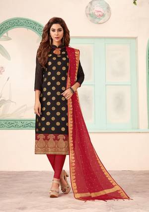 If Those Readymade Suit Does Not Lend You The Desired Comfort, Than Grab This Very Beautiful Designer Dress Material In Black And Red Color And Get This Stitched As Per Your Desired Fit And Comfort. Its Top Is Fabricated On Art Silk Paired With Cotton Bottom And Banarasi Jacquard Dupatta. 