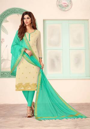 If Those Readymade Suit Does Not Lend You The Desired Comfort, Than Grab This Very Beautiful Designer Dress Material In Cream And Sea Green Color And Get This Stitched As Per Your Desired Fit And Comfort. Its Top Is Fabricated On Art Silk Paired With Cotton Bottom And Banarasi Jacquard Dupatta. 