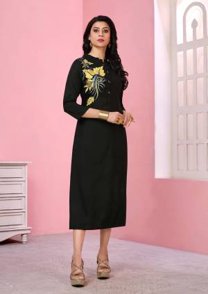 For A Bold And Beautiful Look, Grab This Designer Readymade Kurti In Black Color Fabricated On Rayon. It Is Beautified With Multi Colored Thread Work Over The Side Front. 