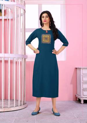 Flaunt Your Rich And Elegant Taste Wearing This Designer Readymade Kurti In Blue Color Fabricated On Rayon. This Kurti Is Beautified With Thread Work Over The Front. Buy This Pretty Piece Now. 