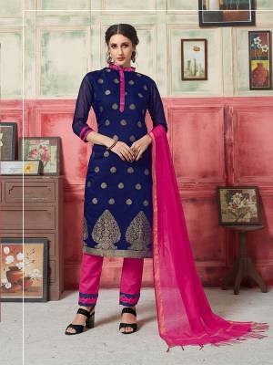 Simple Dress Material Is Here For Your Semi-Casual wear In Royal Blue Colored Top Paired With Contrasting Dark Pink Colored Bottom And Dupatta. This Silk Based Dress Material Is Beautified With Weave. Buy Now.