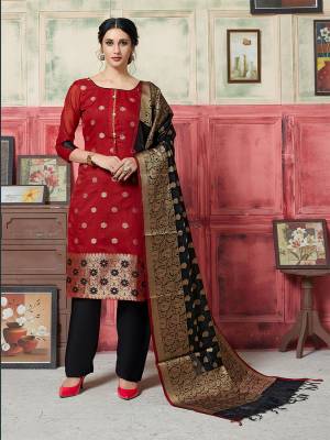 Here Is A Pretty Suit With A Rich Color Pallete In Red Colored Top Paired With Black Colored Bottom and Dupatta. Its Top Is Fabricated On Jacquard Silk Paired With Satoon Bottom And Banarasi Art Silk Dupatta. Buy This Dress Material Now. 