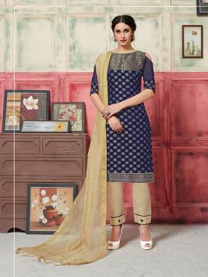 Look Pretty In This Lovely Dress Material In Navy Blue Color Paired With Beige Colored Blouse. This top Is Fabricated On Jacquard Silk Paired With Santoon Bottom And Banarasi art Silk Dupatta. Buy Now.