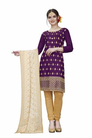 This Festive Season, Adorn A Rich, Simple And Elegant Look With This Dress Material In Wine  Colored Top Paired With Beige Colored Bottom And Cream Colored Dupatta. This Dress Material Is Cotton Based Beautified With Jari Embroidered Butti. Get This Stitched As Per Your Desired Fit And Comfort. 