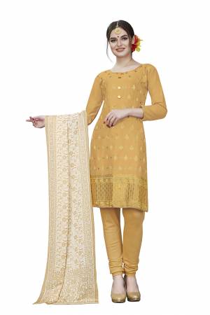 If Those Readymade Suit Does Not Lend You The Desired Comfort Than Grab This Dress Material And Get This Stitched As Per Your Desired Fit And Comfort. Its Top Is In Beige Color Paired With Beige Colored Bottom And Dupatta. Buy This Pretty Elegant Cotton Based Dress Material Now.