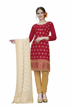 This Festive Season, Adorn A Rich, Simple And Elegant Look With This Dress Material In Red Colored Top Paired With Beige Colored Bottom And Cream Colored Dupatta. This Dress Material Is Cotton Based Beautified With Jari Embroidered Butti. Get This Stitched As Per Your Desired Fit And Comfort. 