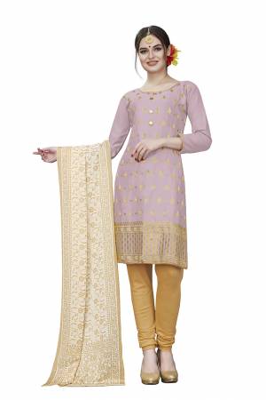 This Festive Season, Adorn A Rich, Simple And Elegant Look With This Dress Material In Lilac Colored Top Paired With Beige Colored Bottom And Cream Colored Dupatta. This Dress Material Is Cotton Based Beautified With Jari Embroidered Butti. Get This Stitched As Per Your Desired Fit And Comfort. 