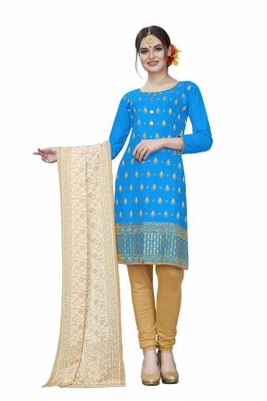 This Festive Season, Adorn A Rich, Simple And Elegant Look With This Dress Material In Blue Colored Top Paired With Beige Colored Bottom And Cream Colored Dupatta. This Dress Material Is Cotton Based Beautified With Jari Embroidered Butti. Get This Stitched As Per Your Desired Fit And Comfort. 