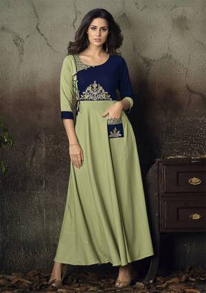 Adorn The Pretty Angelic Look Wearing This Readymade Deisgner Gown In Light Green Color Fabricated On Rayon Beautified With Thread Embroidery. Its Pretty Color And Embroidery Over Yoke Is Making An OverAll Beautiful Piece. Buy Now.