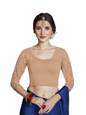 Grab This Designer Patterned Super Comfy Readymade Blouse To Pair Up With Your Simple Or Designer Saree. This Blouse Is Fabricated On Stretchable Cotton With Stretchable Net Sleeves Which Is In Free Size. Its Fabric Is Soft Towards Skin And Ensures Superb Comfort All Day Long.