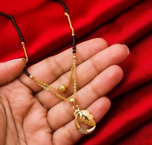 Rich And Elegant Looking Designer Double Chain Mangalsutra Is Here In Golden Color. It Is Light Weight Which Is Easy To Carry All Day Long With Any Colored Attire. Buy Now
